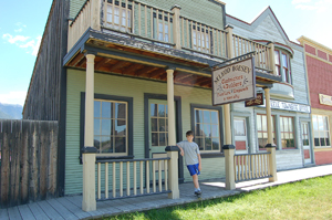Cody in front of the cabinet shop